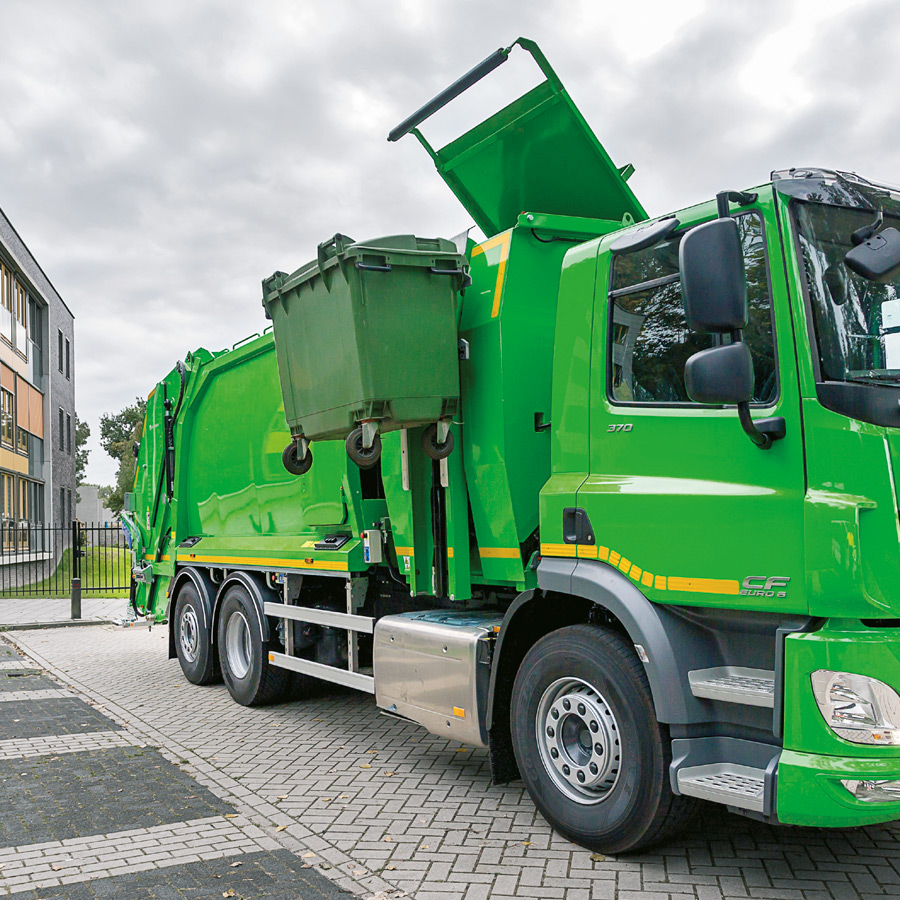 FAUN MF300 skraldebil tømmer affaldsbeholder